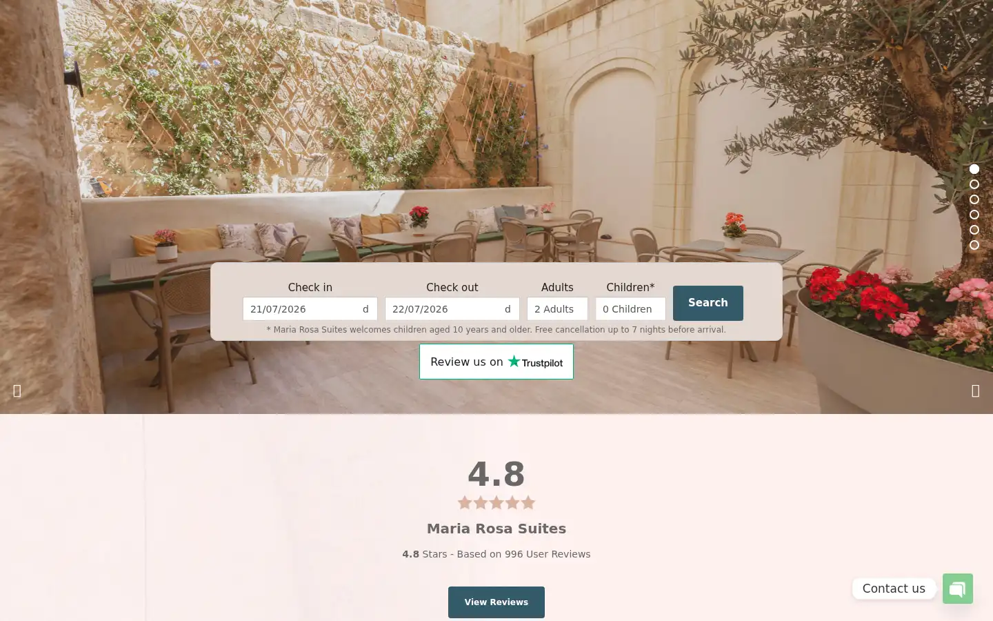 Screenshot of mariarosasuites.com