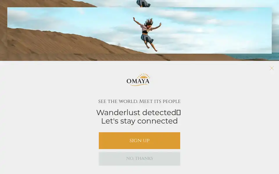 Screenshot of omayatravel.com