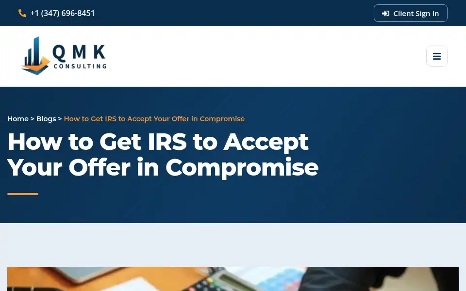 Screenshot of qmkconsulting.com