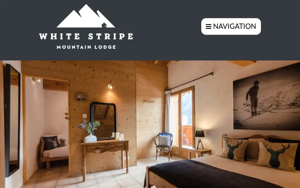 Screenshot of white-stripe-mountain-lodge.com